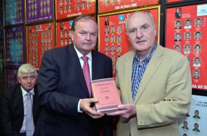 Seamus King making a presentation to GAA President Liam O'Neill at the re-opening of the Lár na Páirce museum