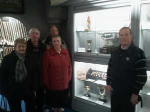 Tim Crowe's grandniece and grandnephews pictured beside his medal belt